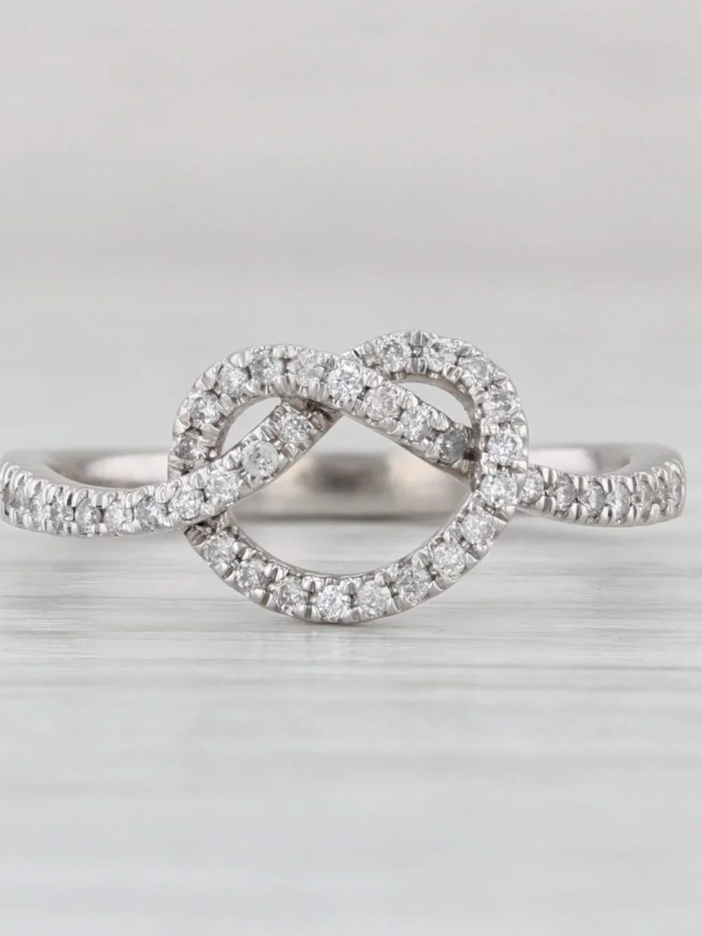 0.25ctw Diamond Preztle Knot Ring 10k White Gold Size 7.5